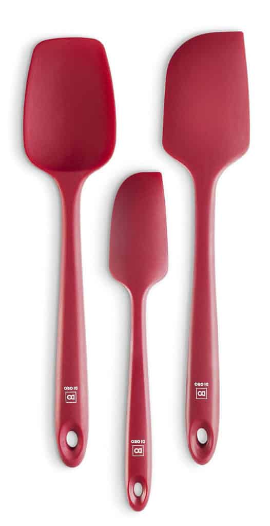 three differently sized red silicone scraping spatulas