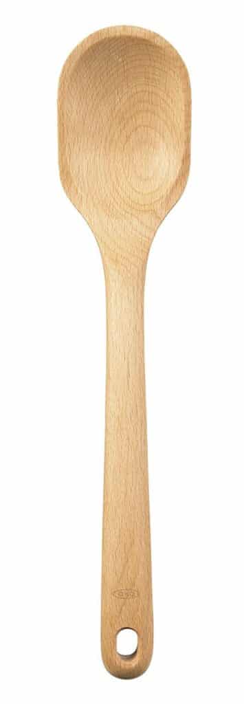 a light brown colored wooden serving spoon