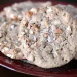 close view of salted peanut cookies on a red platter