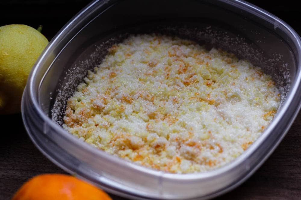 citrus sugar in a small plastic container