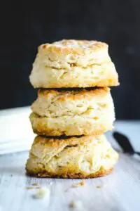three Buttermilk Biscuits stacked on top of each other