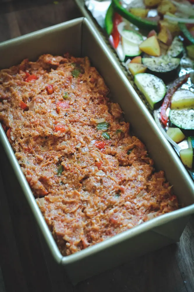 Sausage and Peppers Meatloaf in a loaf pan before baking