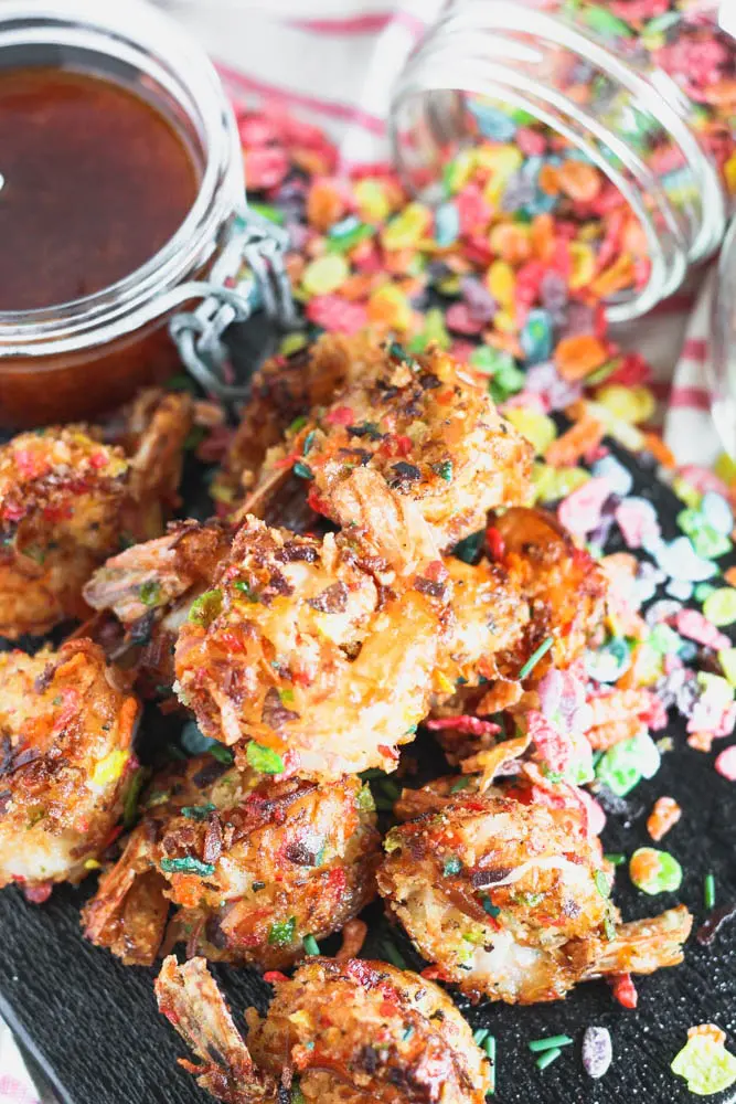 Cooked shrimp crusted in coconut and crushed fruity pebbles