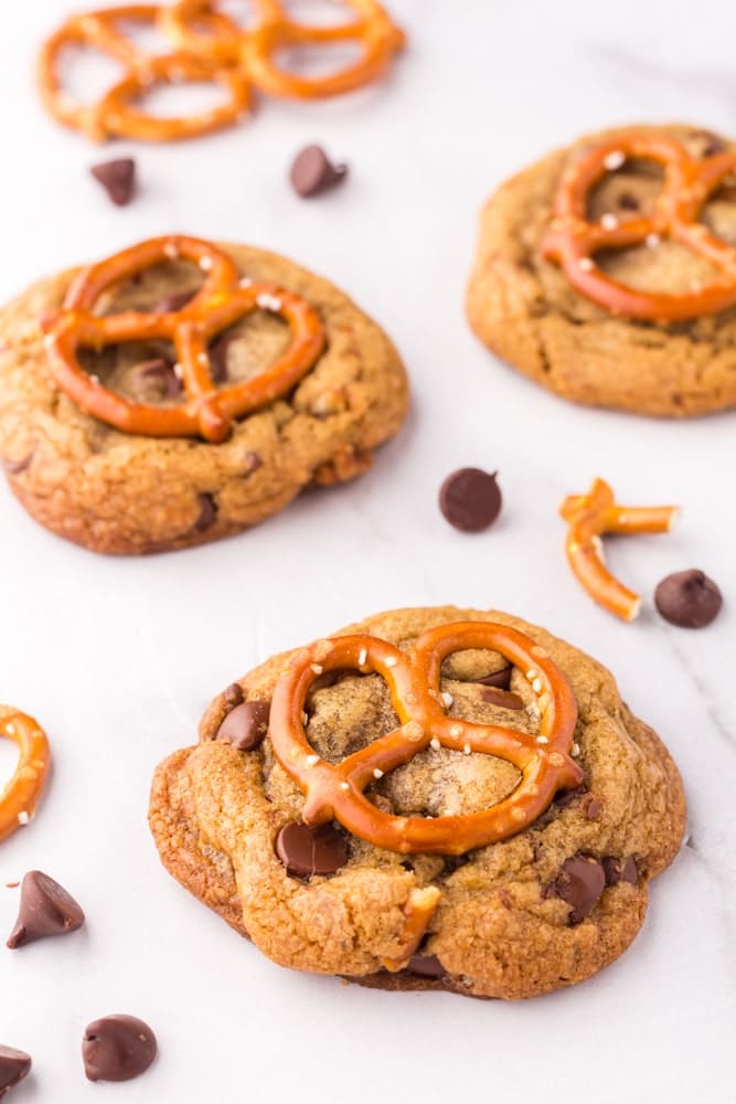 Brown Butter Chocolate Chip Cookies with Pretzels on white marble counter
