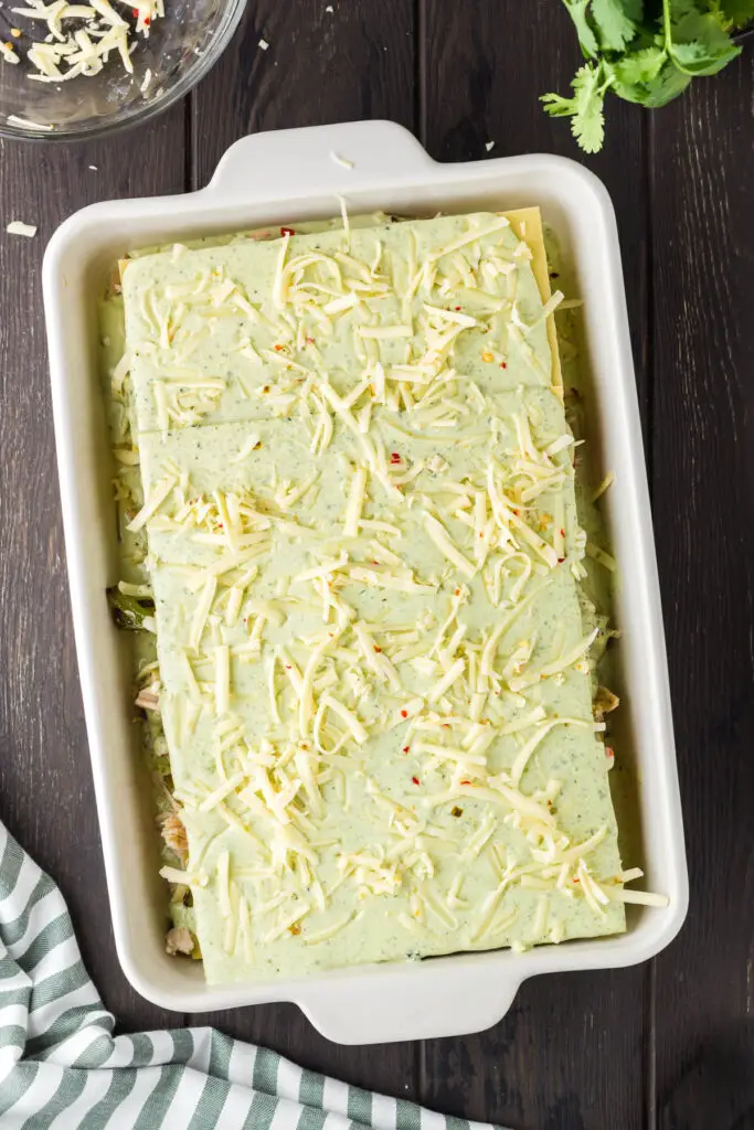 full pan of mexican chicken lasagna before baking