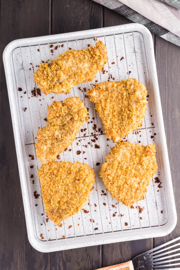 Sheet pan of French Onion Pork Chops after baking.