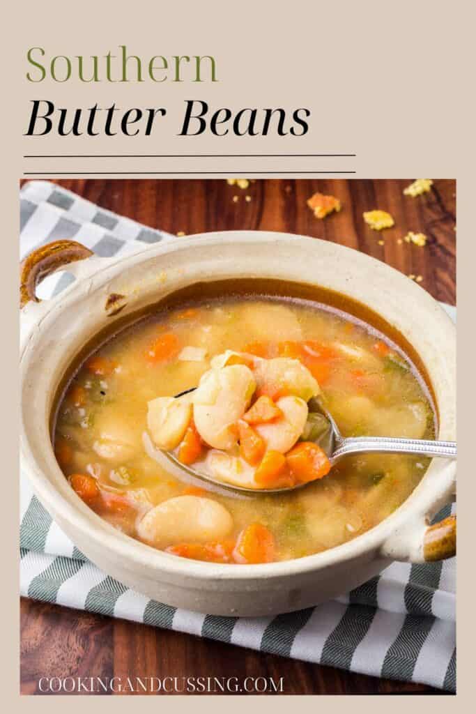 Bowlful of butter beans with a spoonful being lifted out.